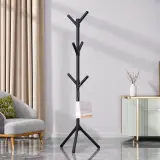 علاقة ملابس أرضية مودرن بتصميم شجرة بقاعدة ثلاثية متينة