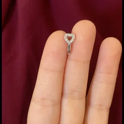 Fake heart nose piercing