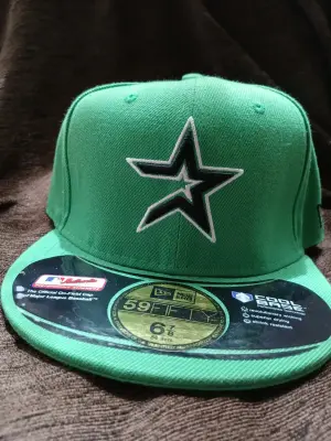 flat green cap