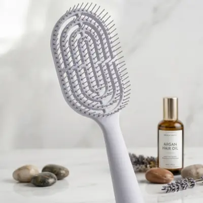 Une brosse à cheveux qui fait pas mal