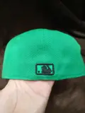 flat green cap