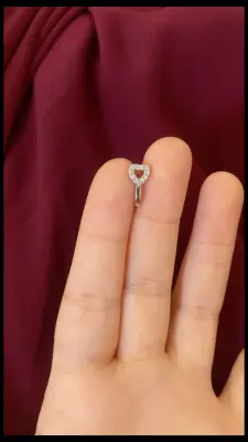 Fake heart nose piercing