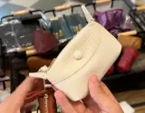 Mini pochette porte-monnaie en cuir grainé