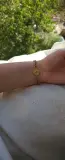 Bracelet gourmette à médaillon rond