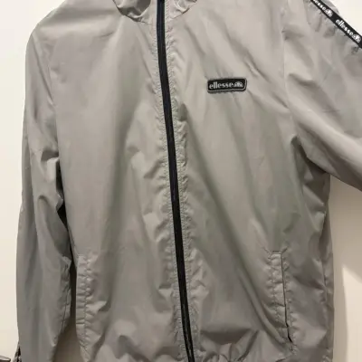 Coupe-vent Ellesse gris homme veste zippée bandes logo