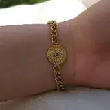 Bracelet gourmette à médaillon rond
