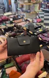 Portefeuille en cuir froissé avec rabat couronne dorée