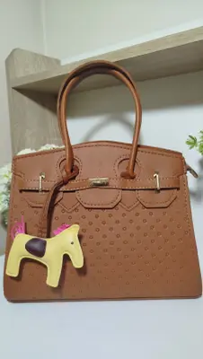 حقيبة H بني