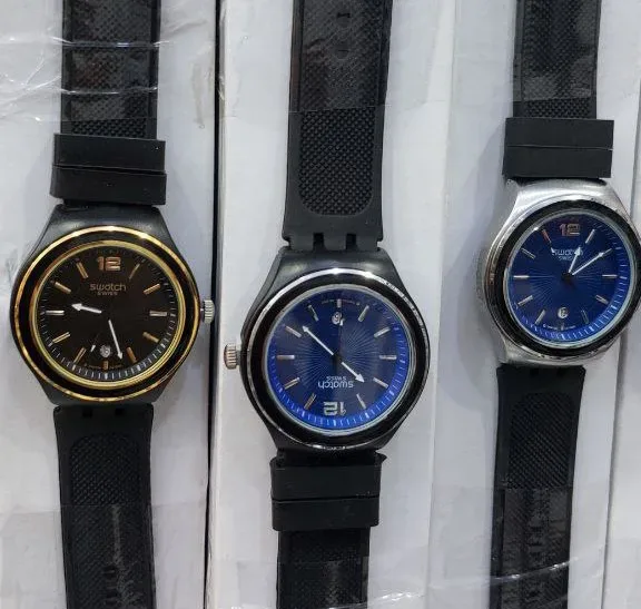 ساعة يد شبابية swatch لون ( )