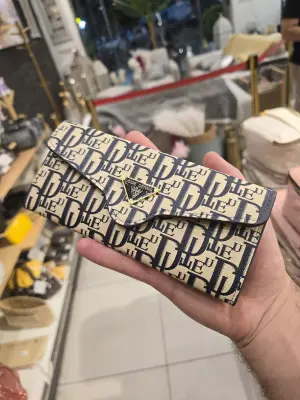 Portefeuille compact motif imprimé monogramme