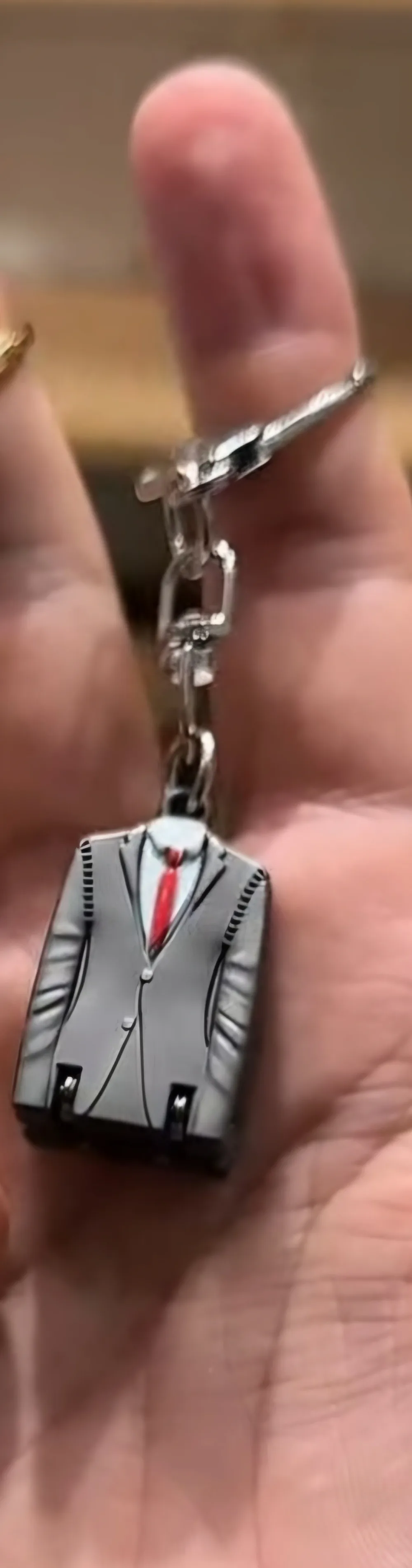 Porte clé& coupe ongle 2en1
