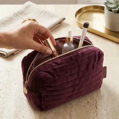 Pochette velours aubergines, Schwarzkopf