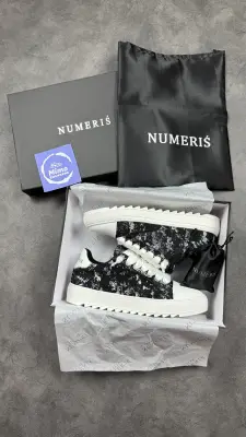 Numeris black Tache