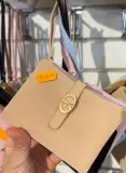 Portefeuille en cuir texturé avec fermoir nœud doré