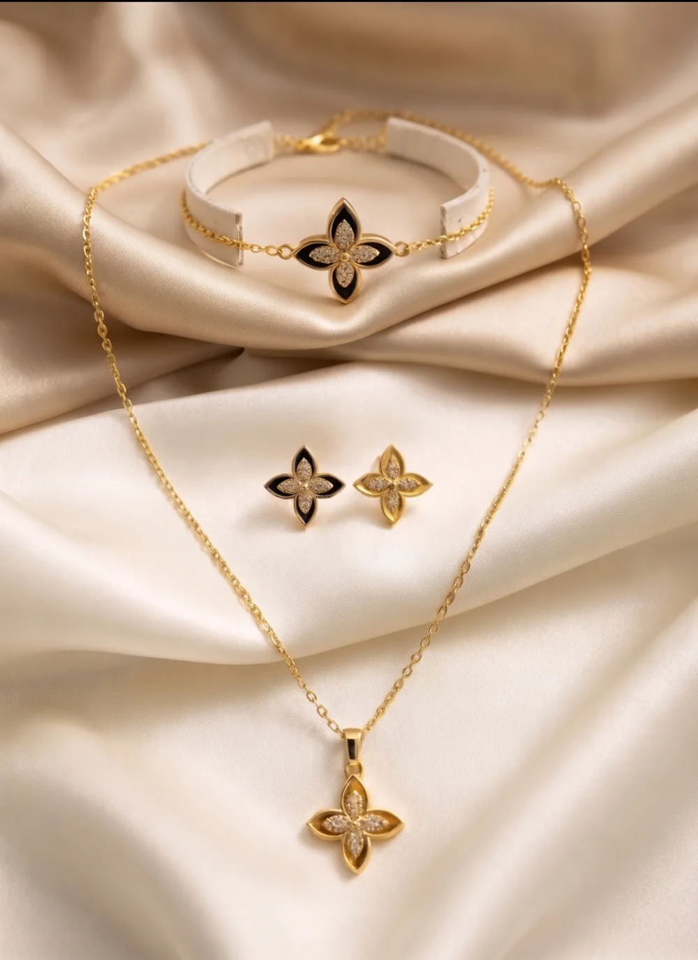 طقم الزهرة الذهبية الأنيق             Parure Élégance Fleur Dorée