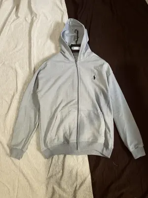 Veste polo gris