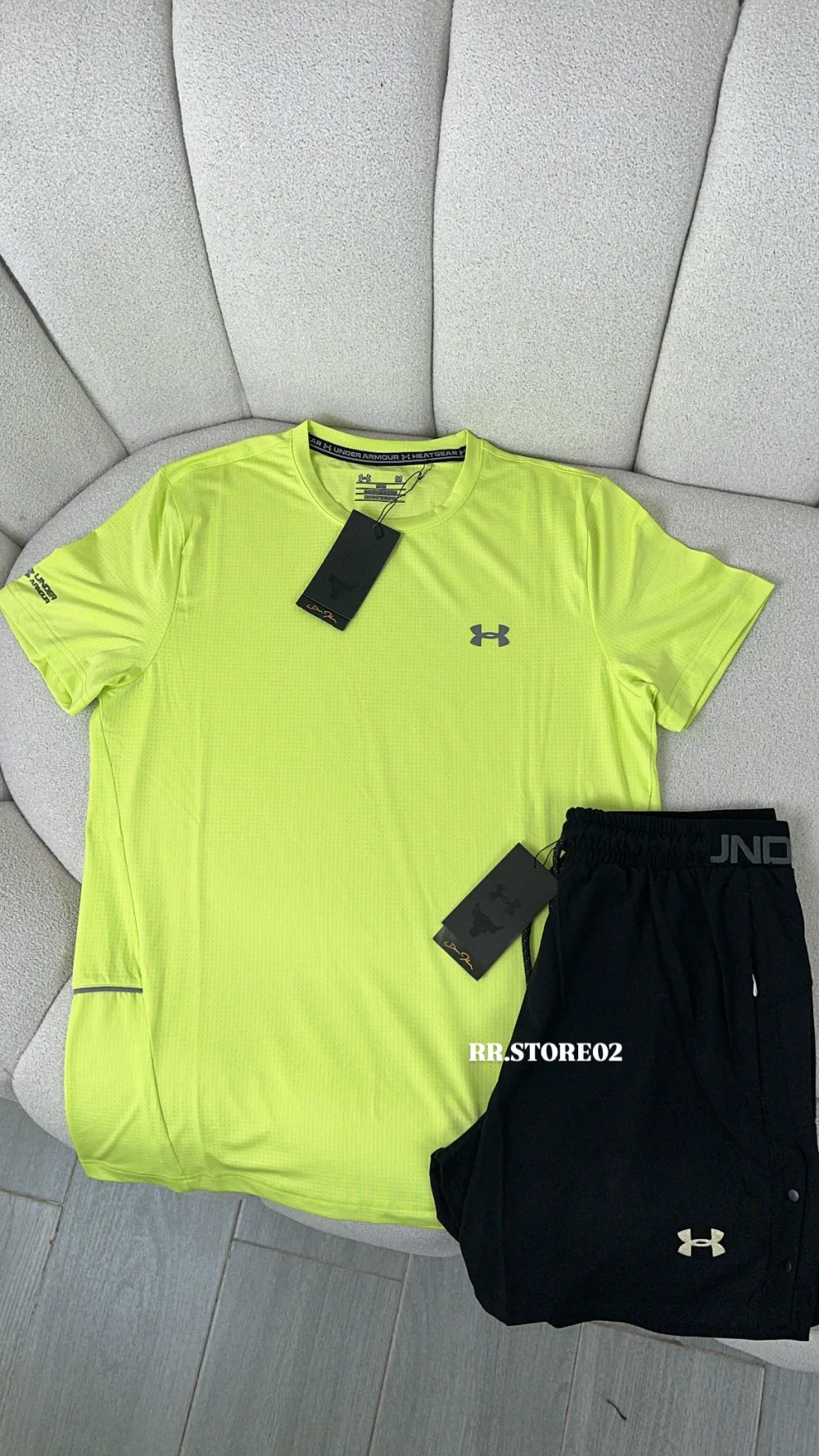 Ensemble running under armour vert pistache