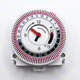 مؤقت زمني (24 ساعة)  Minuteur mécanique