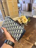 Portefeuille zippé double compartiment – Motif monogramme bleu marine