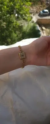 Bracelet gourmette à médaillon géométrique