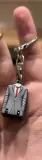 Porte clé& coupe ongle 2en1