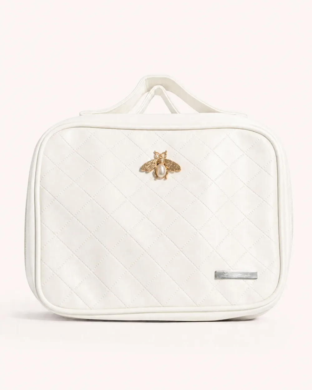 Trousse de toilette matelassée avec broche abeille