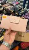 Portefeuille en cuir froissé avec rabat couronne dorée