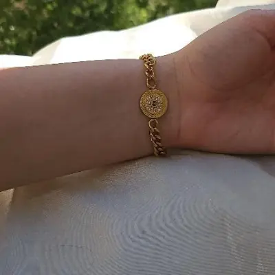 Bracelet gourmette à médaillon rond