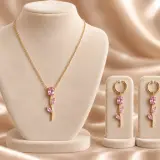 Ensemble collier et boucles à pierres roses