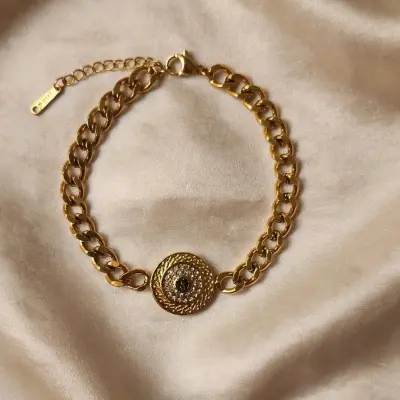 Bracelet gourmette à médaillon rond