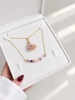 طقم البجعة /swarovski.(سلسلة + سوار+الكيس والعلبة مجانا💙)🦢 [موديل 2]