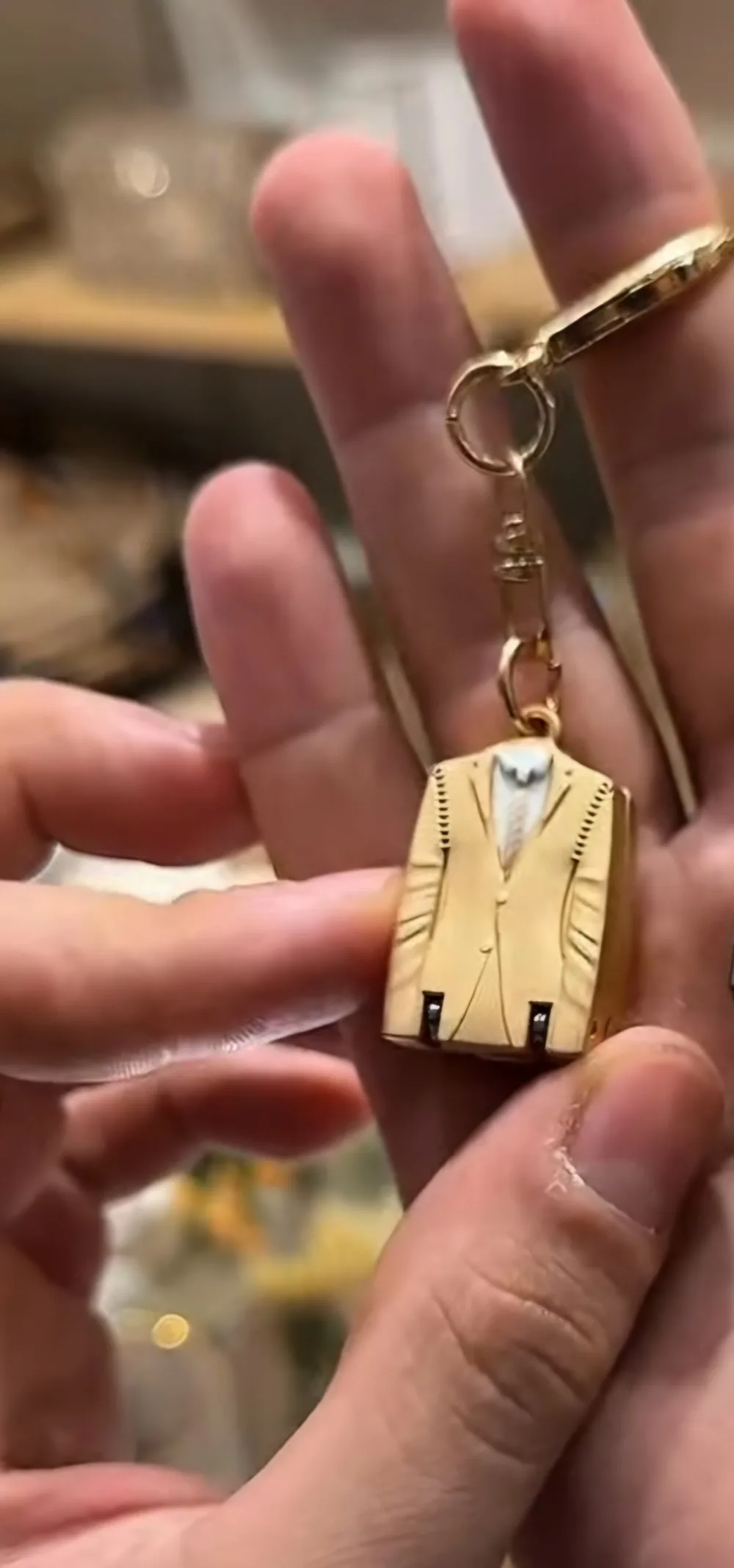Porte clé& coupe ongle 2en1