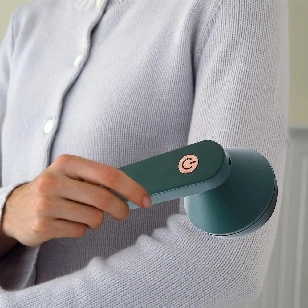 Éliminateur de peluches de vêtements électrique portable - الة الكهربائية المحمولة  لازالة الوبر من الملابس