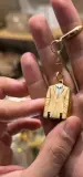Porte clé& coupe ongle 2en1