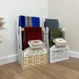 حامل السجادة والمصحف