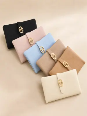 Portefeuille en cuir texturé avec fermoir nœud doré
