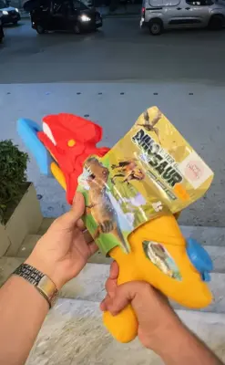 Dinosaur Water Gun » (pistolet à eau dinosaure)