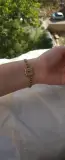 Bracelet gourmette à médaillon géométrique