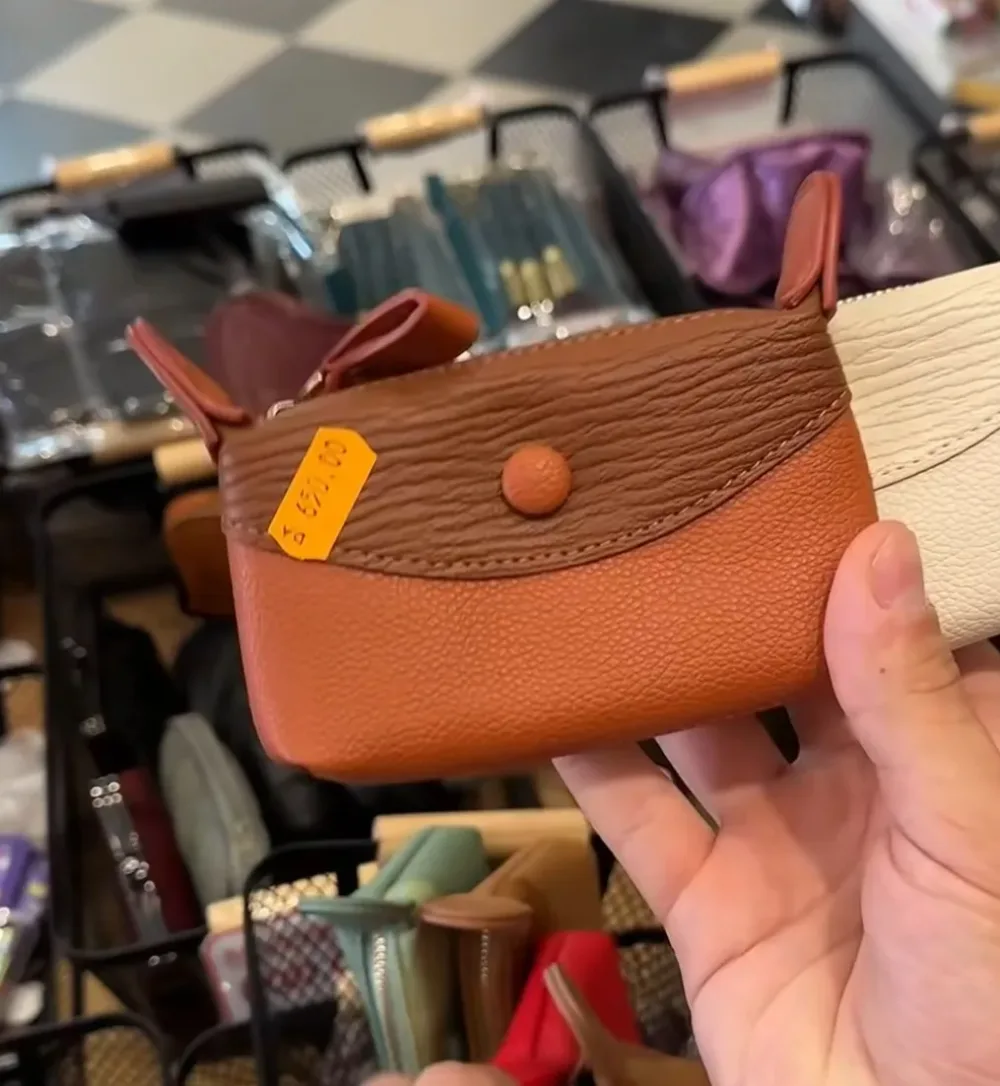 Mini pochette porte-monnaie en cuir grainé