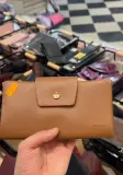 Portefeuille en cuir froissé avec rabat couronne dorée