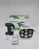 مصباح LED شمسي مقاوم للماء بتقنية SMD 77، مصباح خارجي للحديقة أو الشارع، مصباح حائط يعمل بالطاقة الشمسية على شكل كاميرا وهمية، مصابيح خارجية