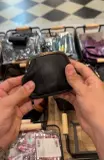 Porte-monnaie en cuir véritable, fermoir clic-clac et poche zippée