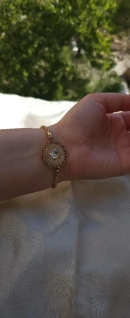 Bracelet médaillon floral serti