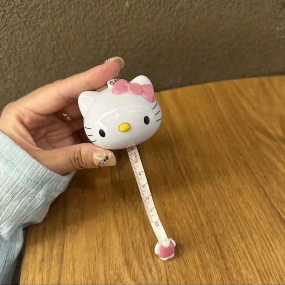 Mettre ruban Hello Kitty